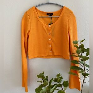 Delia’s Oh my clementine 🍊 waffle long sleeve crop top